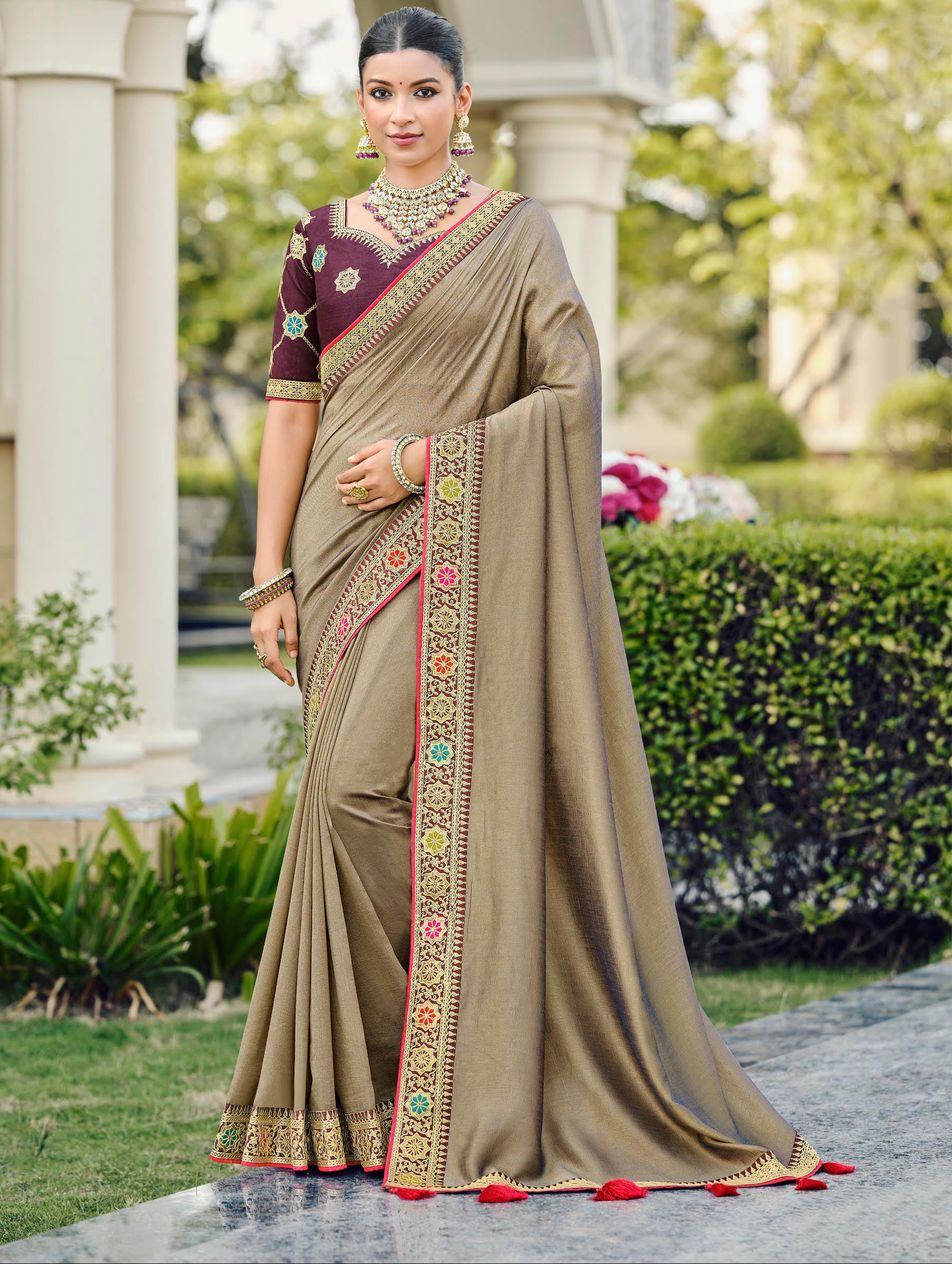 Beige Silk Saree with Rich Embroidered Border and Maroon Blouse