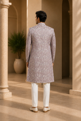 Elegant Floral Jacquard Sherwani for Men – Pastel Pink Wedding & Festive Wear, back view on model