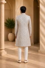 Ivory Cream Paisley Brocade Sherwani for Men, back view on model