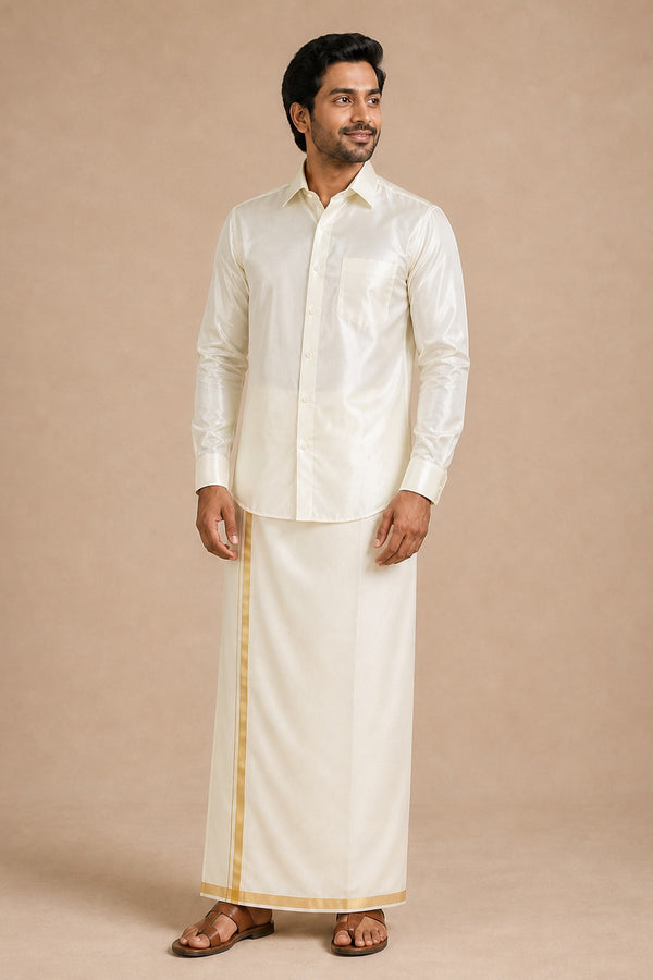 Rajavivaha cream silk shirt for men, worn with a cream gold-bordered veshti, full length front view on model