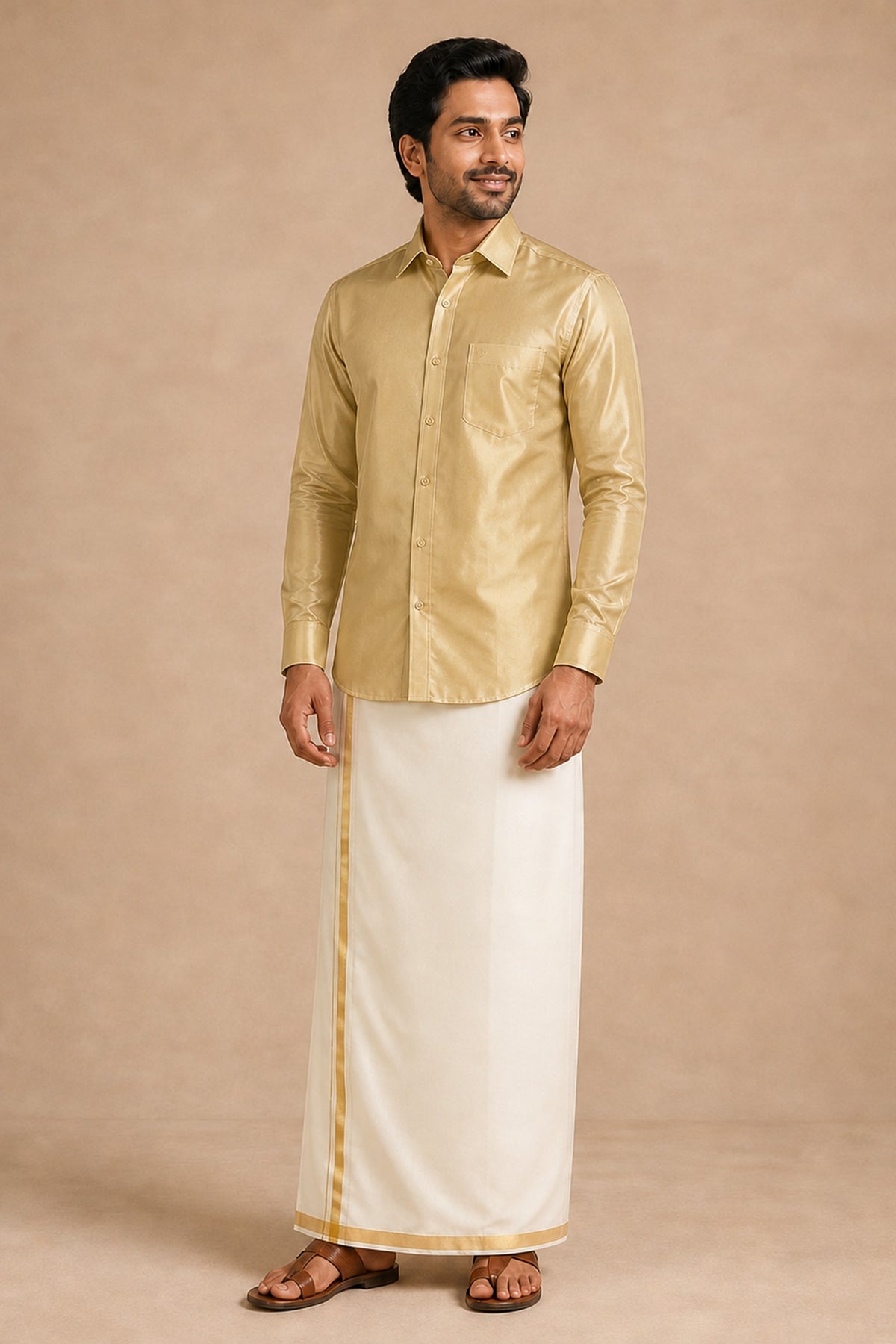 Rajavivaha gold silk shirt for men, worn with a cream gold-bordered veshti, full length front view on model